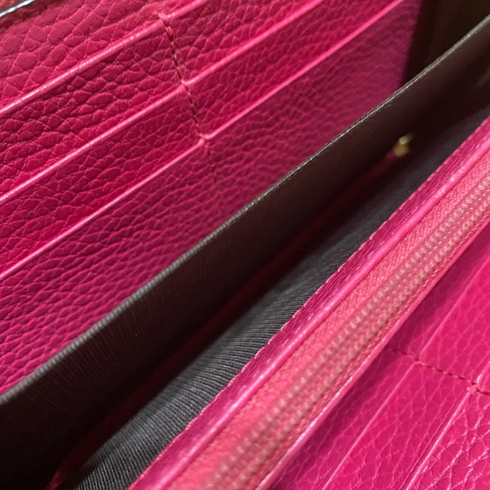 Gucci GG Marmont zip-around wallet in shocking pink